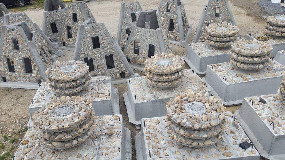Rows of concrete reef modules at a fabrication yard