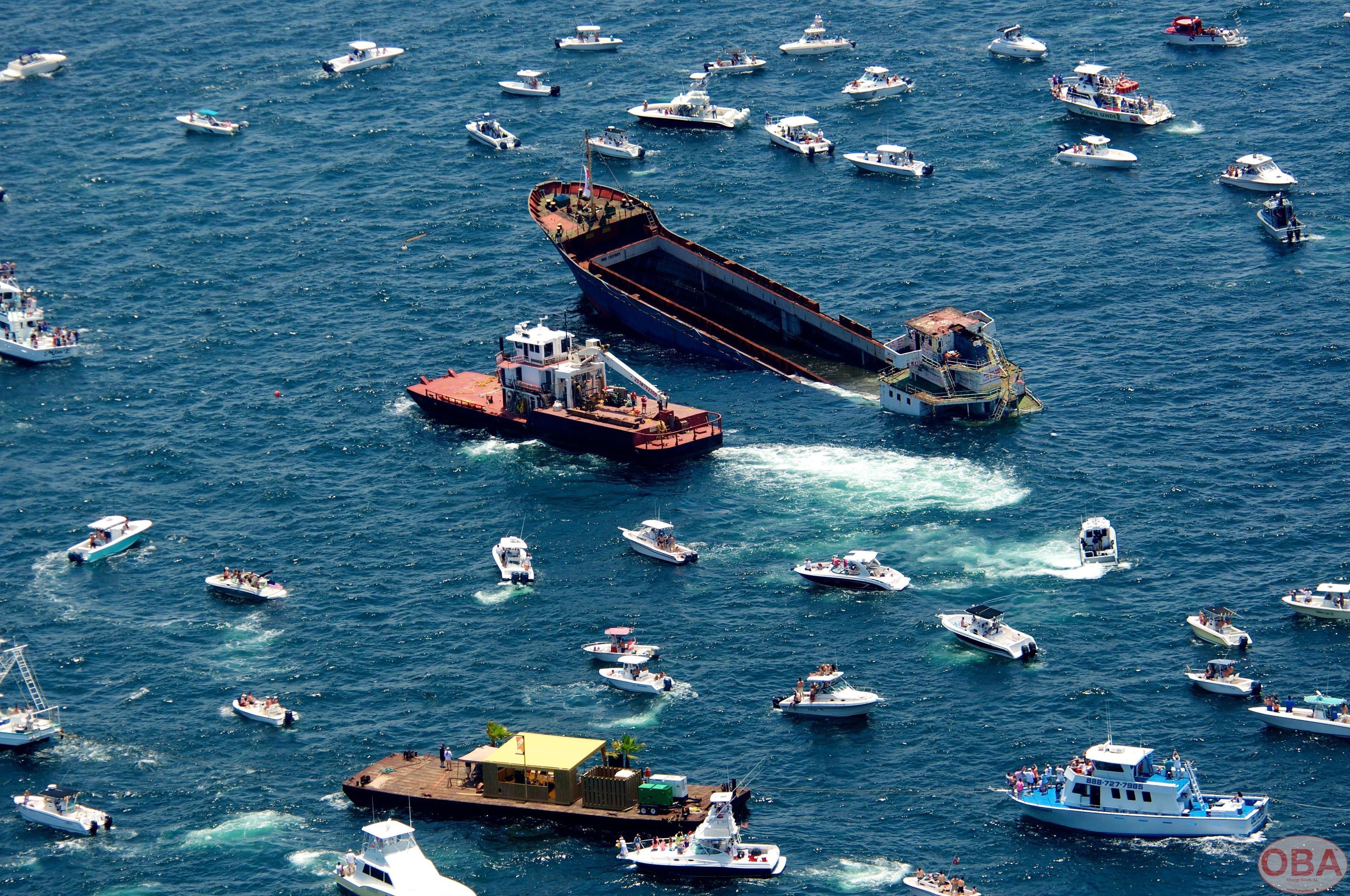 LuLu vessel partially submerged during the final stage of its sinking